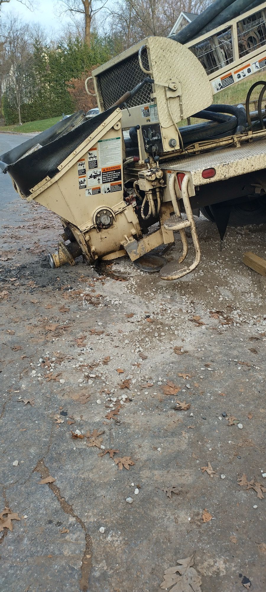 A&S trailer-mounted concrete line pump parked at a job site